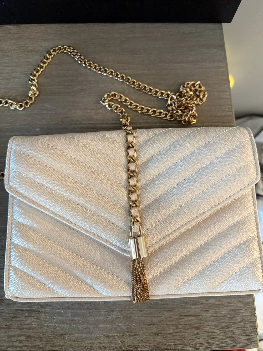 Elegant Cream Quilted Shoulder Bag with Gold Chain Tassel